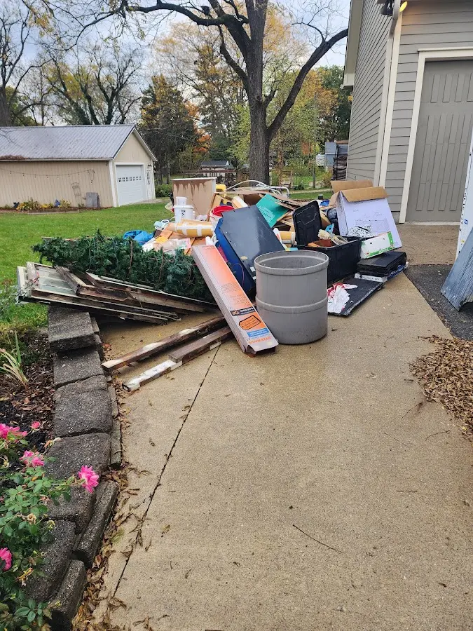 Dumpster being loaded with debris for Residential Dumpster Rental in Schaumburg